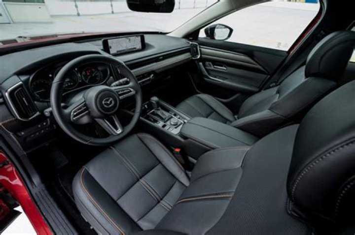 How did the Mazda design the CX 5 front seats to reduce fatigue on long drives?