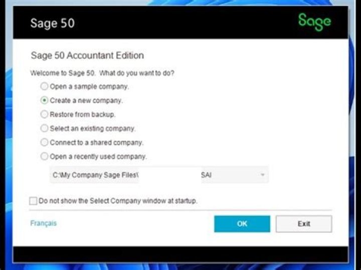 How do I open an existing company in Sage 50?
