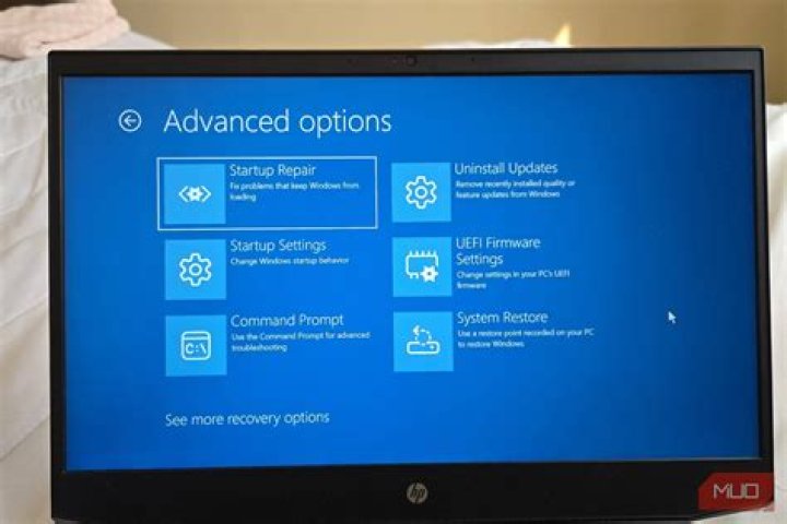 How do I restore my HP Windows 7 laptop to factory settings?