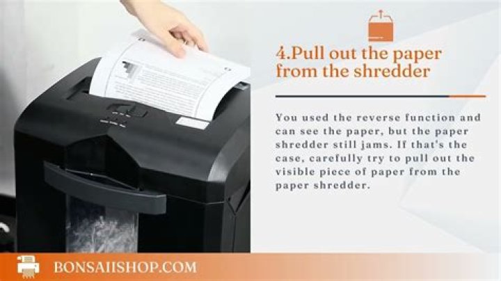 How do you clean a jammed shredder?