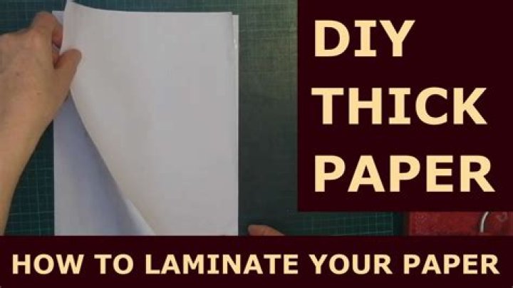 How do you uncurl laminated paper?