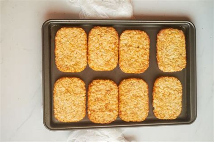 How long do you cook frozen hash brown patties in the oven?