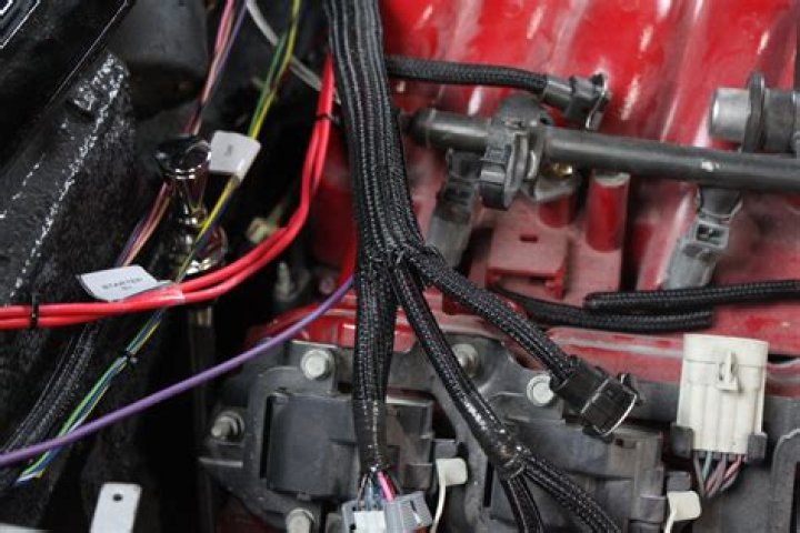 How much does it cost to replace a wiring harness in a car?