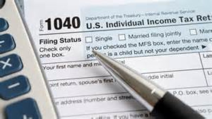 Why do I have to put my spouse's income on my tax return?